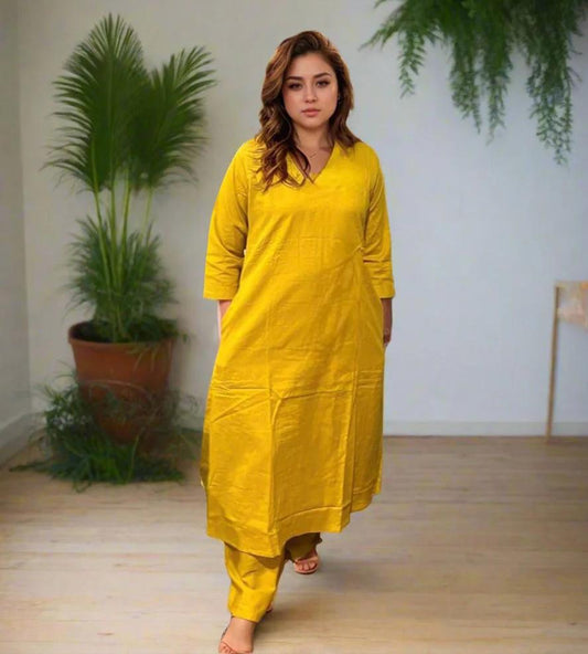 Stylish Solid Cotton Blend Straight Kurta with Plazzo Pants in Mustard