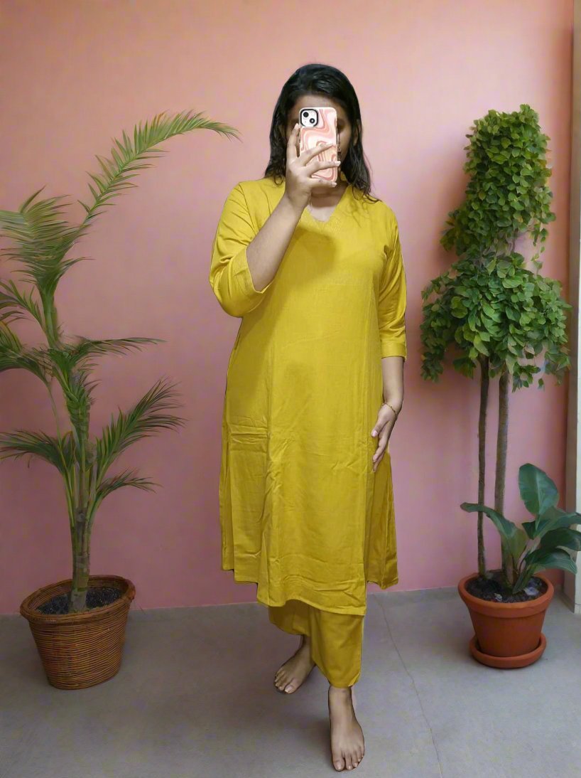 Stylish Solid Cotton Blend Straight Kurta with Plazzo Pants in Mustard
