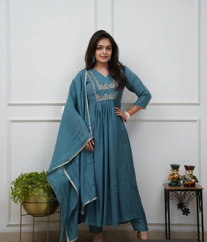 Beautiful Muslin Silk Anarkali Duppata Suit In Teal Colour.