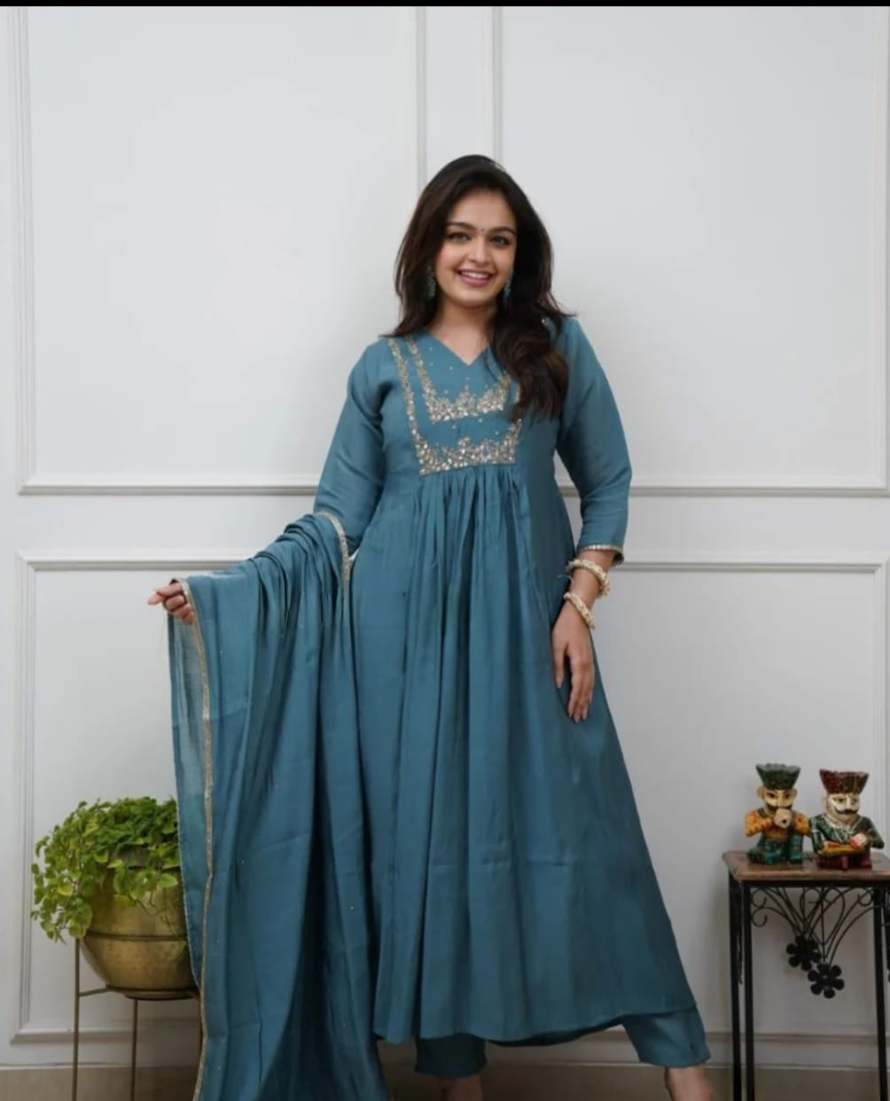 Beautiful Muslin Silk Anarkali Duppata Suit In Teal Colour.