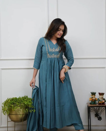 Beautiful Muslin Silk Anarkali Duppata Suit In Teal Colour.