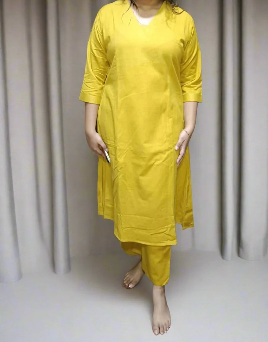 Stylish Solid Cotton Blend Straight Kurta with Plazzo Pants in Mustard